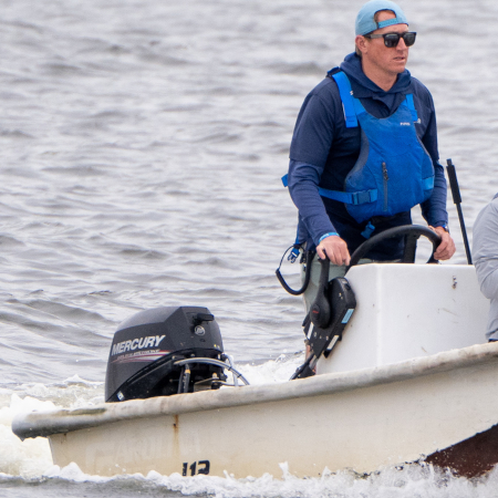 Driving a skiff on Shoreline Lake.